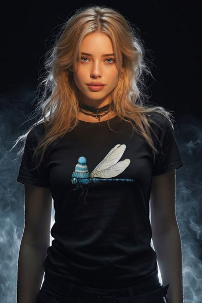 Woman with long blonde hair wearing a black t-shirt featuring a cute dragonfly wearing a beanie graphic design