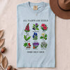All Plants Are Edible Some Only Once Botanical Chart T-Shirt - Chambray folded t-shirt mockup