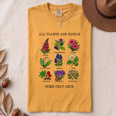 All Plants Are Edible Some Only Once Botanical Chart T-Shirt - Mustard folded t-shirt mockup