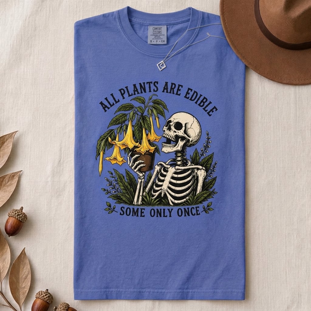 All Plants Are Edible Some Only Once T-Shirt - Flo Blue folded t-shirt mockup