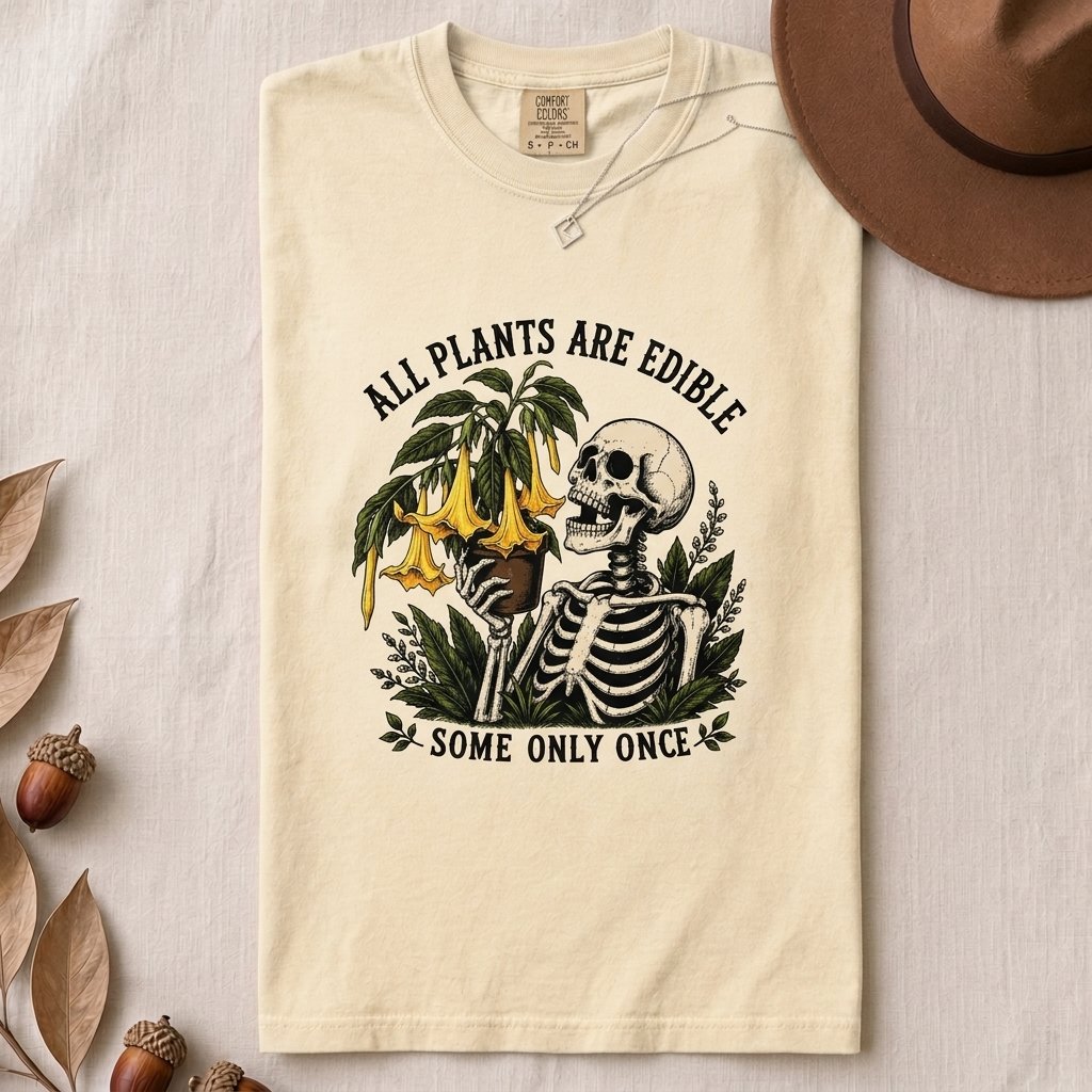 All Plants Are Edible Some Only Once T-Shirt - Ivory folded t-shirt mockup