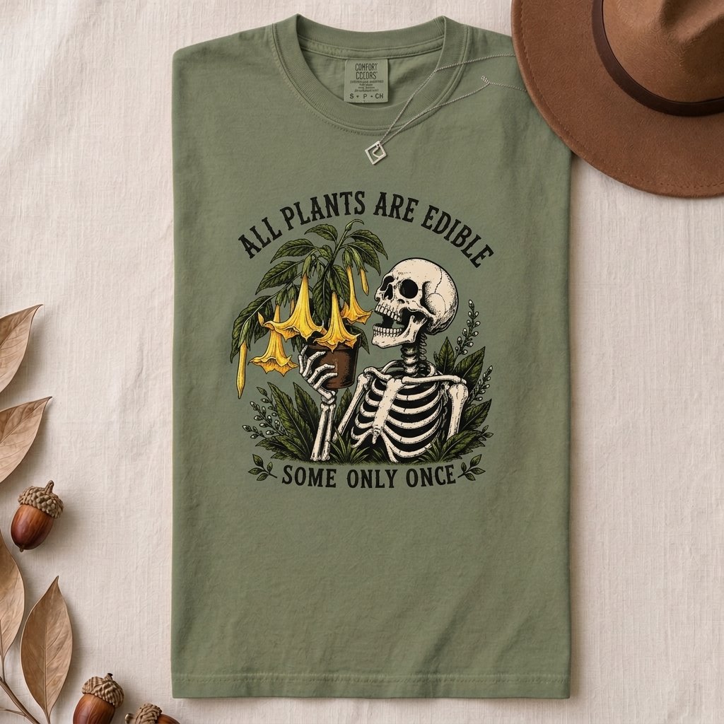 All Plants Are Edible Some Only Once T-Shirt - Moss folded t-shirt mockup