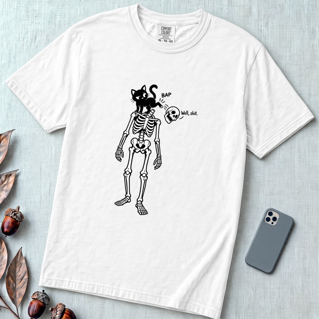 Cat Knocks Skull Off Graphic Tee, Black Cat vs Skeleton Funny T-Shirt - White unfolded t-shirt mockup