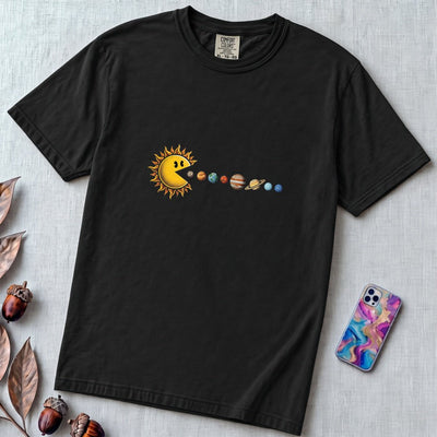 Cosmic Appetite - Sun Pac-Man Eating Planets - Unisex garment-dyed heavyweight t-shirt - Black unfolded t-shirt mockup
