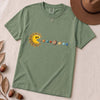 Cosmic Appetite - Sun Pac-Man Eating Planets - Unisex garment-dyed heavyweight t-shirt - Light Green unfolded t-shirt mockup