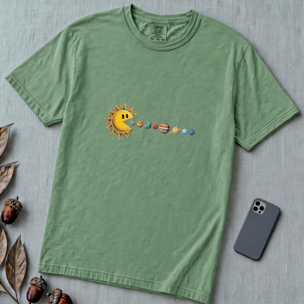 Cosmic Appetite - Sun Pac-Man Eating Planets - Unisex garment-dyed heavyweight t-shirt - Light Green unfolded t-shirt mockup
