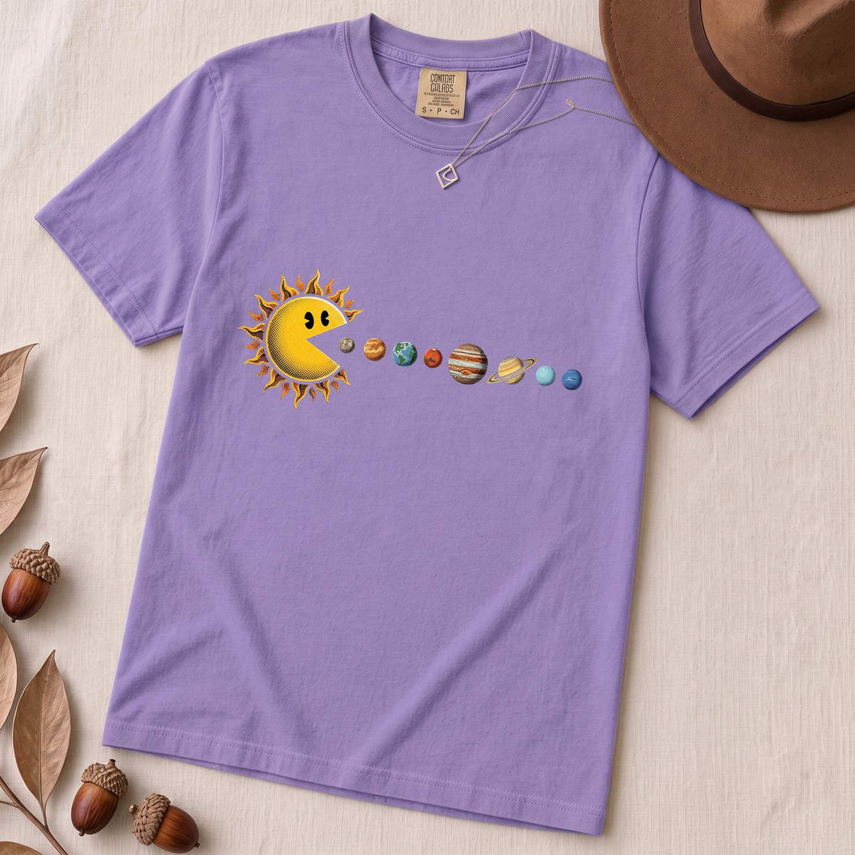 Cosmic Appetite - Sun Pac-Man Eating Planets - Unisex garment-dyed heavyweight t-shirt - Violet unfolded t-shirt mockup