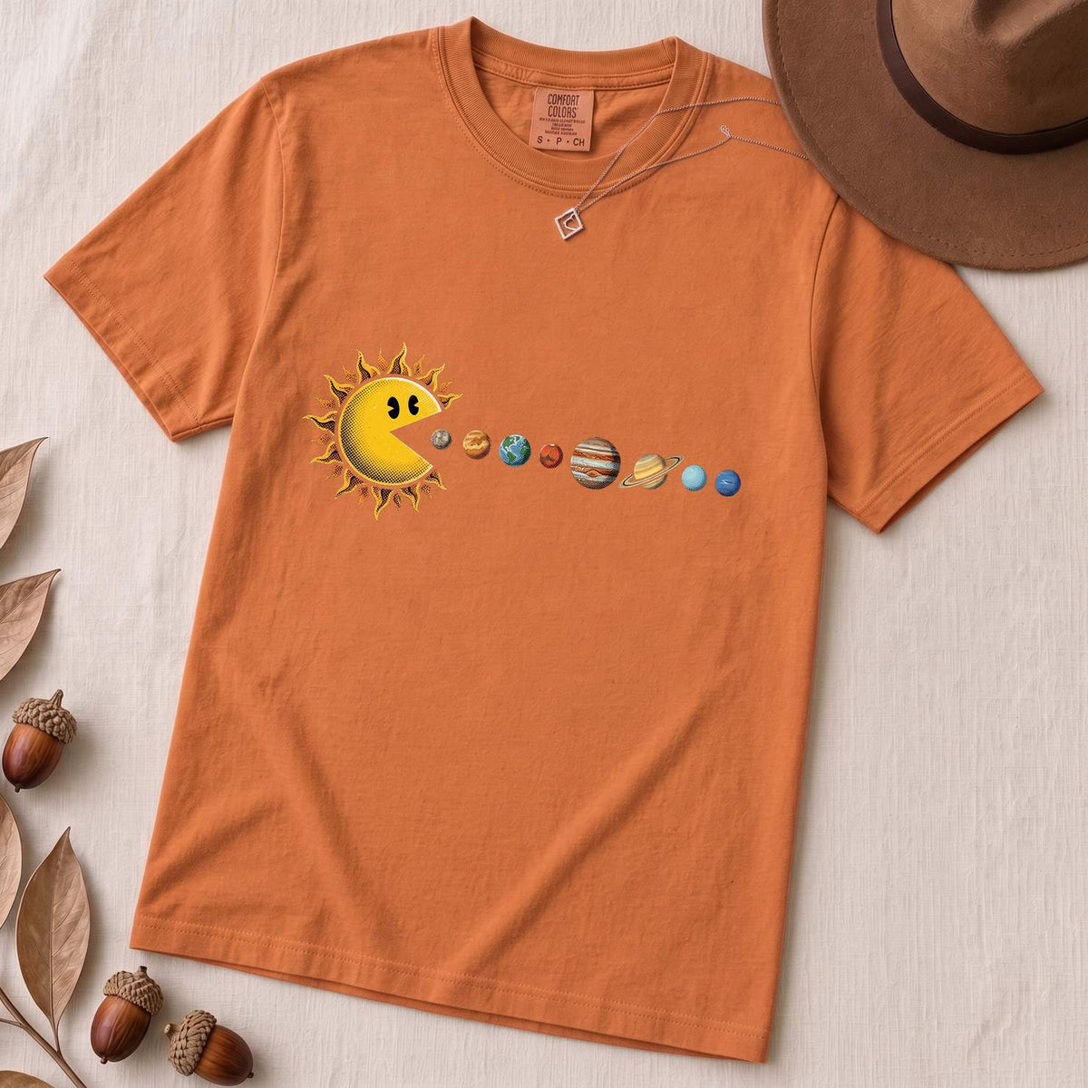 Cosmic Appetite - Sun Pac-Man Eating Planets - Unisex garment-dyed heavyweight t-shirt - Yam unfolded t-shirt mockup