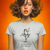 Person wearing a t-shirt with a frog dancer graphic and text on an orange background