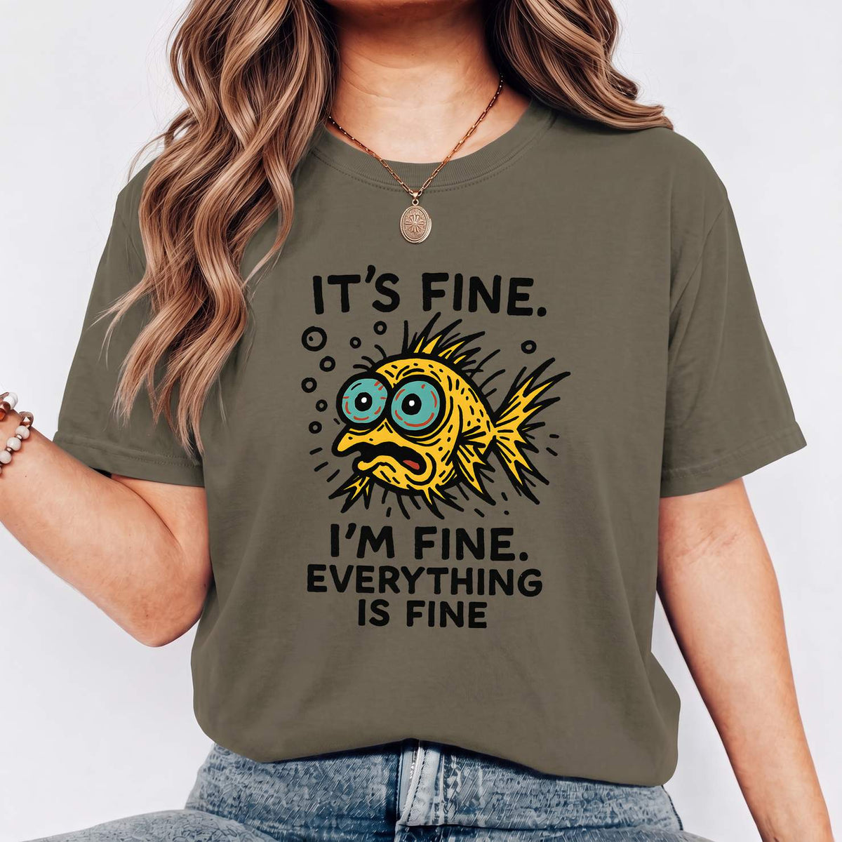 Funny Fish “It’s Fine” Mental Health Humor Sarcastic Panic Meme Tee - Army on-model t-shirt mockup