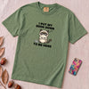 I Put My Book Down To Be Here Shirt, Funny Grumpy Cat Book Lover Tee - Light Green unfolded t-shirt mockup