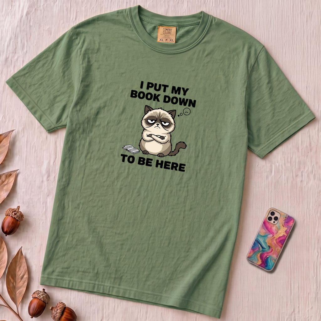 I Put My Book Down To Be Here Shirt, Funny Grumpy Cat Book Lover Tee - Light Green unfolded t-shirt mockup
