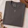 Just a t-shirt. Comfort Colors unisex garment-dyed heavyweight plain t-shirt with Radiant Art logo on right sleeve - Graphite folded t-shirt mockup