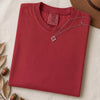 Just a t-shirt. Comfort Colors unisex garment-dyed heavyweight plain t-shirt with Radiant Art logo on right sleeve - Red folded t-shirt mockup