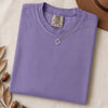 Just a t-shirt. Comfort Colors unisex garment-dyed heavyweight plain t-shirt with Radiant Art logo on right sleeve - Violet folded t-shirt mockup