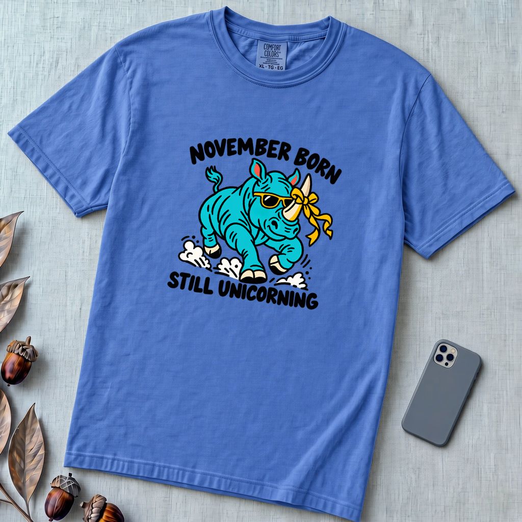November Born Still Unicorning T-Shirt, Funny Rhino Birthday Tee - Flo Blue unfolded t-shirt mockup