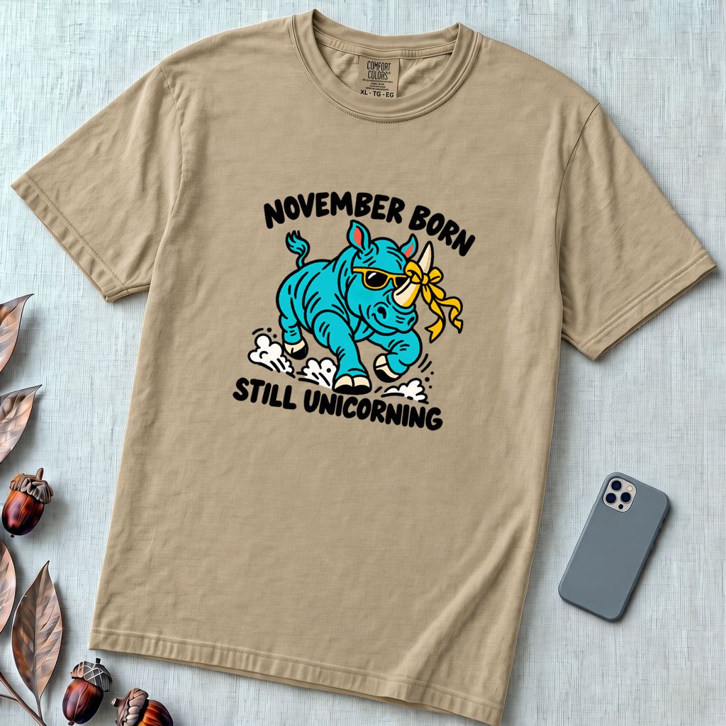 November Born Still Unicorning T-Shirt, Funny Rhino Birthday Tee - Sandstone unfolded t-shirt mockup