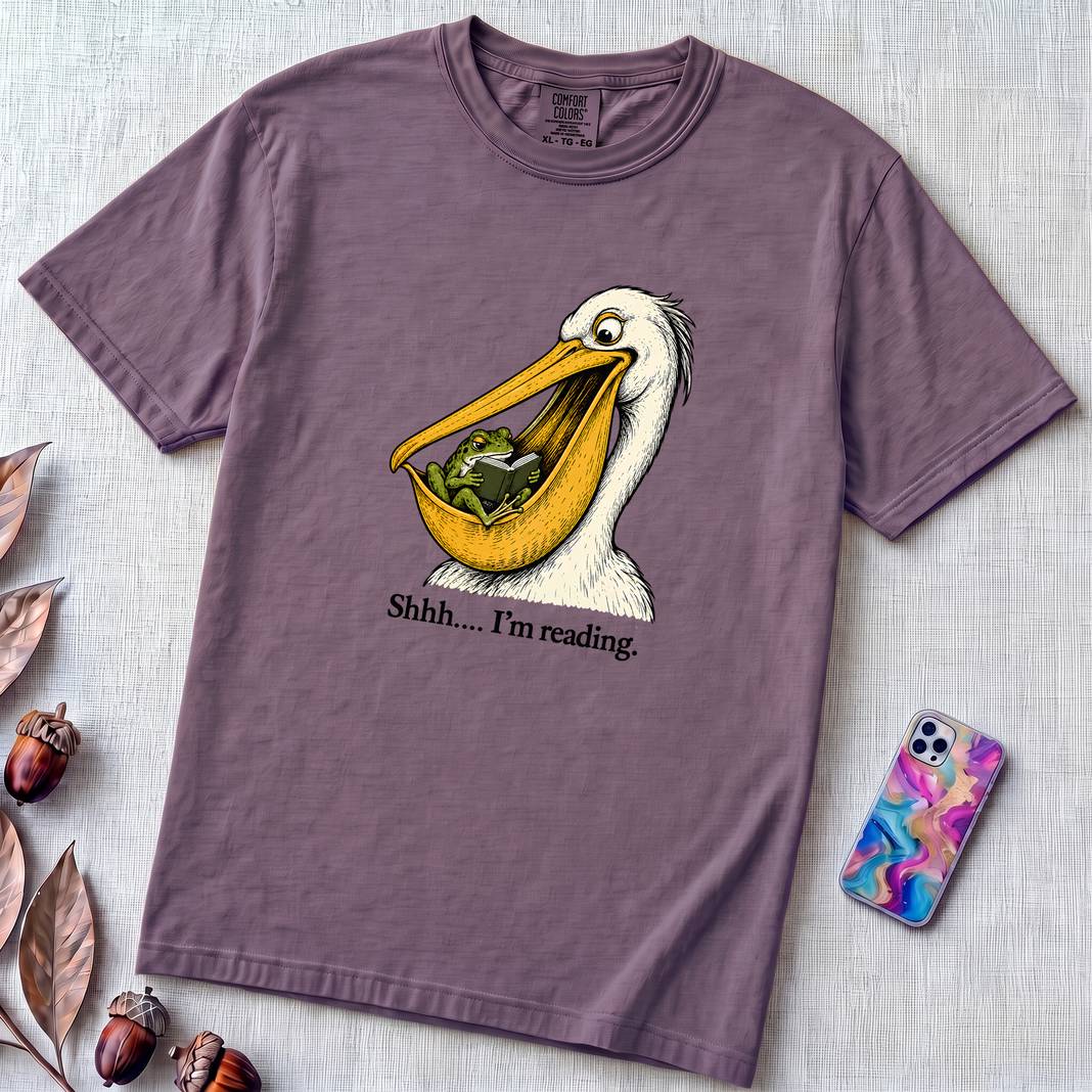Shhh… I’m Reading Pelican Frog T-Shirt - Grape unfolded t-shirt mockup