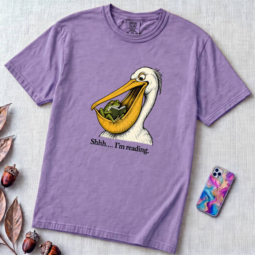 Shhh… I’m Reading Pelican Frog T-Shirt - Violet unfolded t-shirt mockup