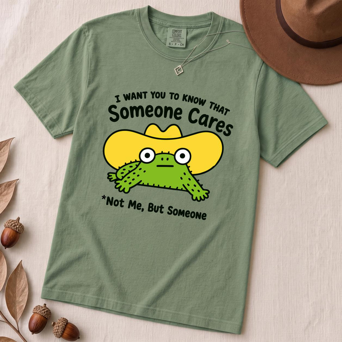 Someone Cares - Not Me, But Someone T-Shirt, Sarcastic Humor - Light Green unfolded t-shirt mockup