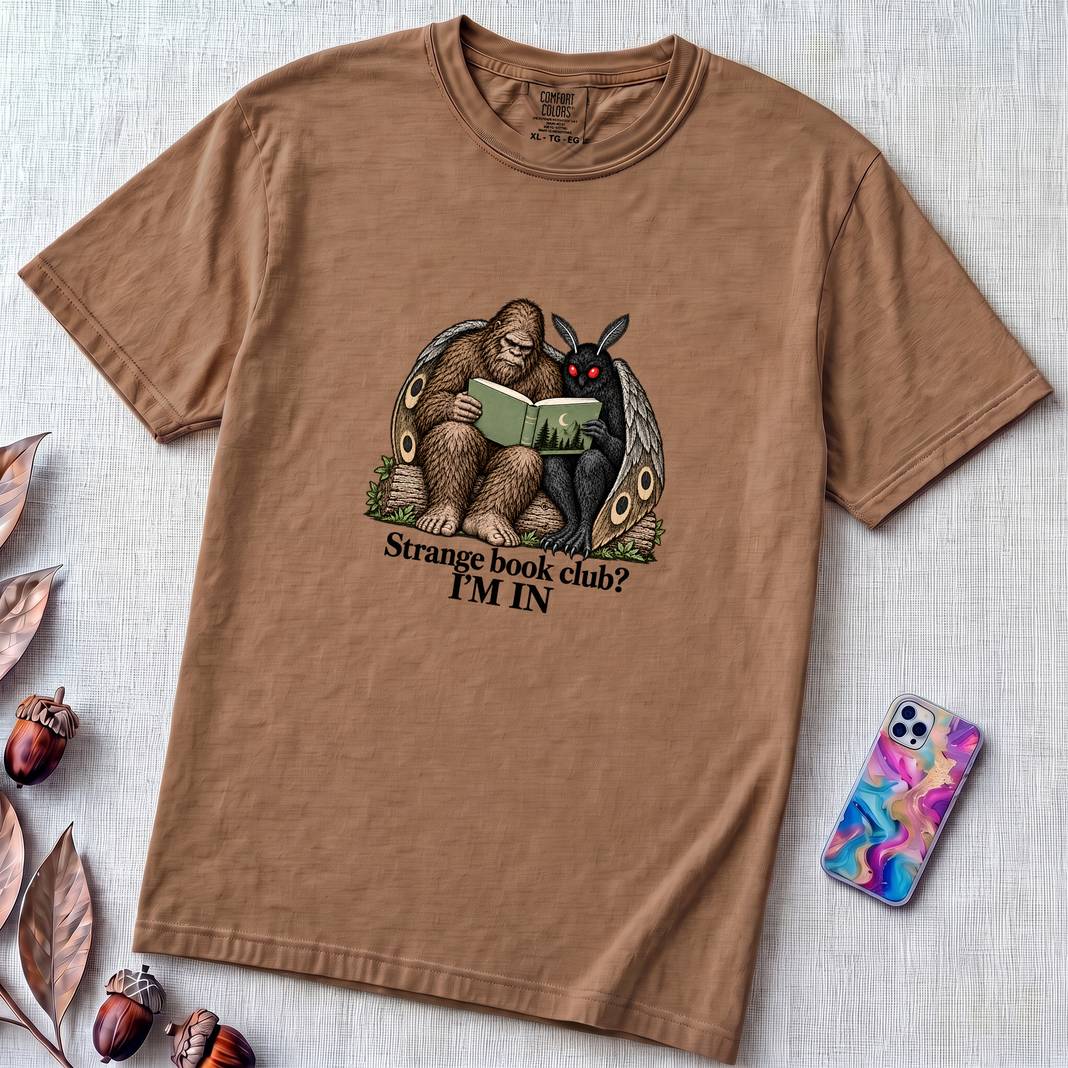 Strange Book Club? I’m In,  Funny Cryptid T-Shirt, Bigfoot and Mothman are reading - Espresso unfolded t-shirt mockup