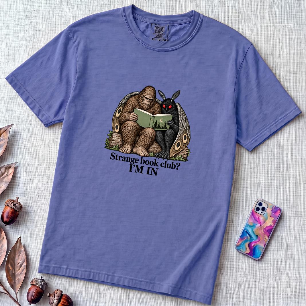 Strange Book Club? I’m In,  Funny Cryptid T-Shirt, Bigfoot and Mothman are reading - Flo Blue unfolded t-shirt mockup