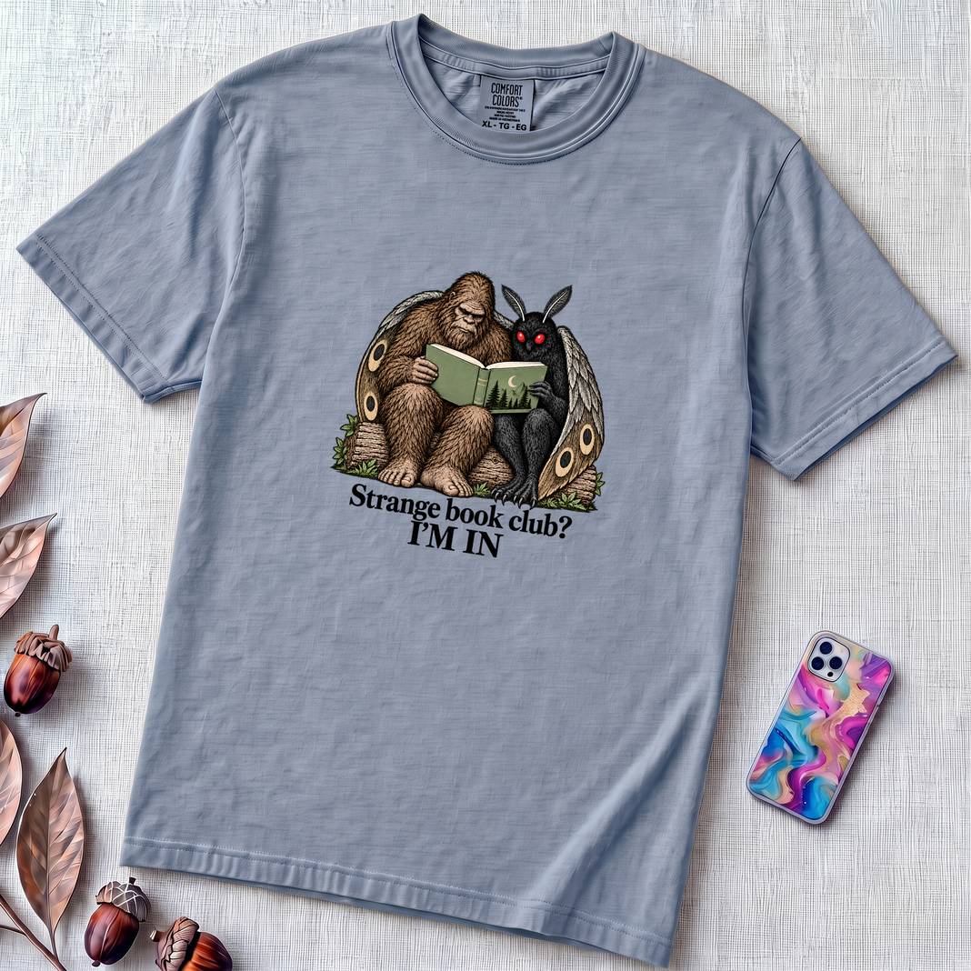 Strange Book Club? I’m In,  Funny Cryptid T-Shirt, Bigfoot and Mothman are reading - Washed Denim unfolded t-shirt mockup