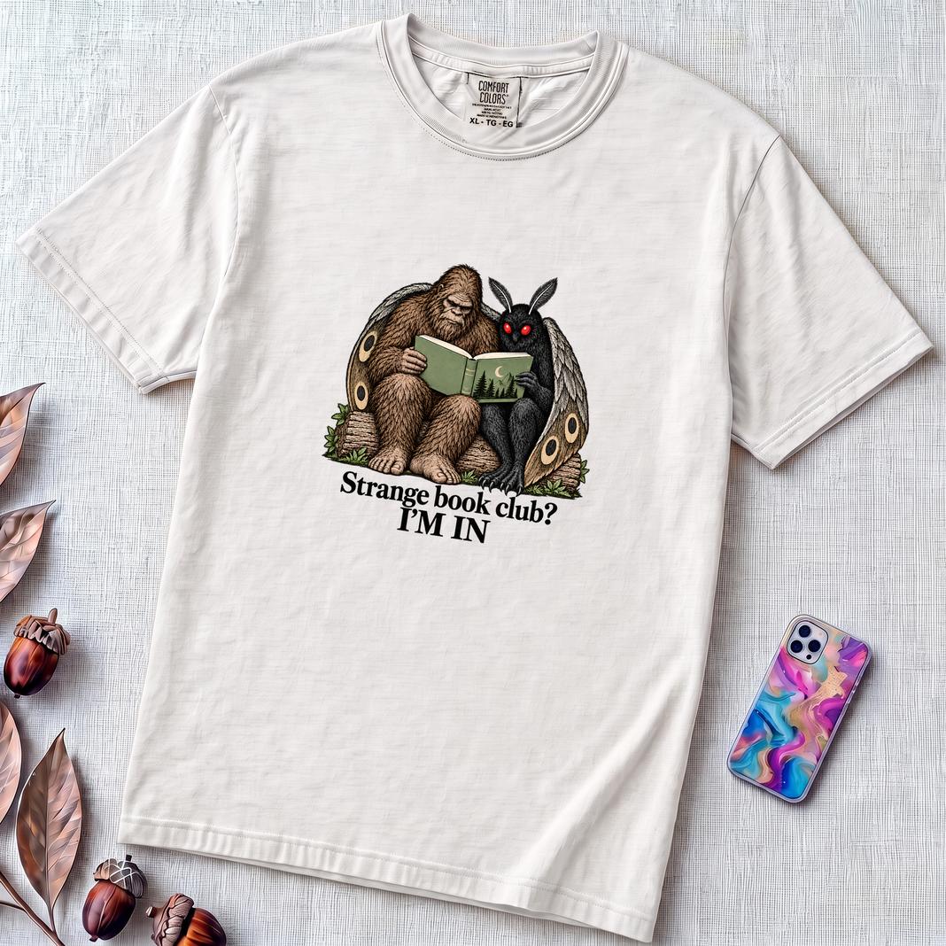 Strange Book Club? I’m In,  Funny Cryptid T-Shirt, Bigfoot and Mothman are reading - White unfolded t-shirt mockup
