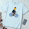 The Surreal Commute, Rene Magritte-Inspired Cycling T-shirt - Chambray unfolded t-shirt mockup
