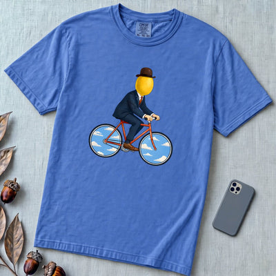 The Surreal Commute, Rene Magritte-Inspired Cycling T-shirt - Flo Blue unfolded t-shirt mockup
