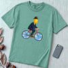 The Surreal Commute, Rene Magritte-Inspired Cycling T-shirt - Seafoam unfolded t-shirt mockup