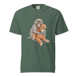 Green t-shirt with a graphic of two monkeys on a white background