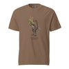 Brown t-shirt with a Spinosaurus mirabilis illustration and a plush toy on a white background