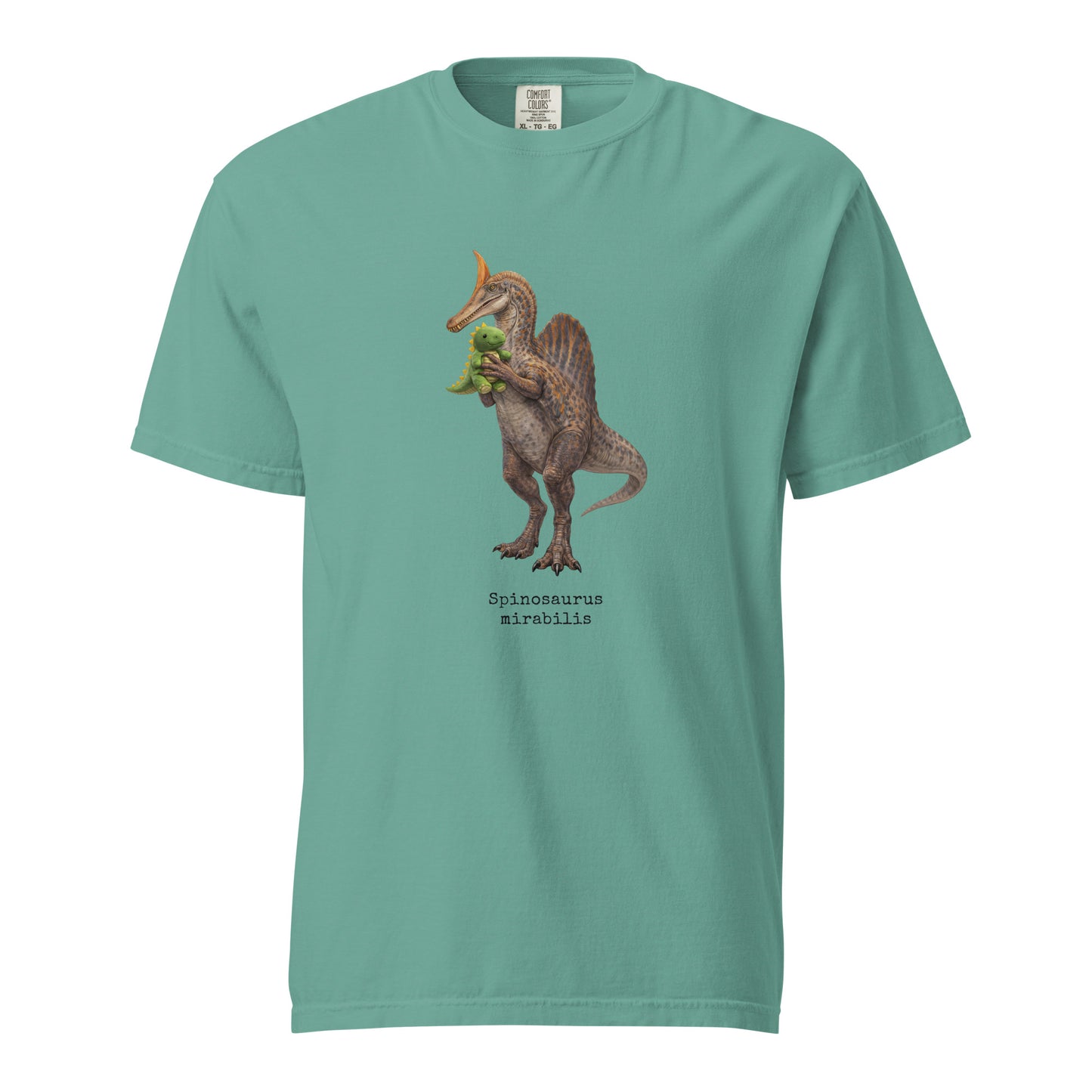 Teal t-shirt with a Spinosaurus mirabilis and a plush toy on a white background