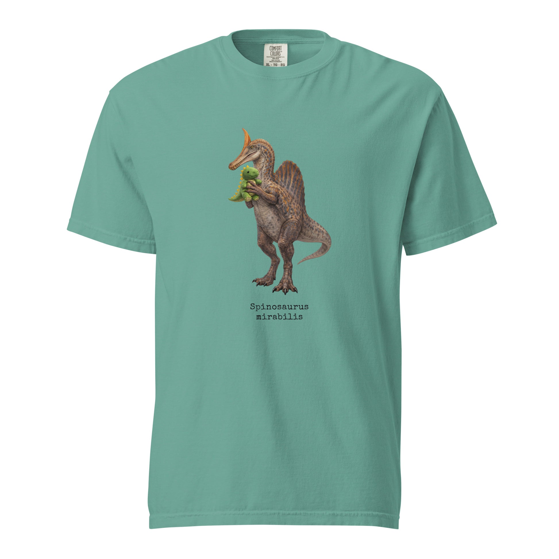 Teal t-shirt with a Spinosaurus mirabilis and a plush toy on a white background