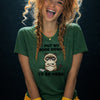 Woman with curly blonde hair in braids laughing with tongue out wearing green Grumpy Cat t-shirt "I Put My Book Down To Be Here"