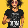 Woman with curly dark hair and pink sunglasses wearing black Fitness Mom Club t-shirt with workout women silhouettes graphic