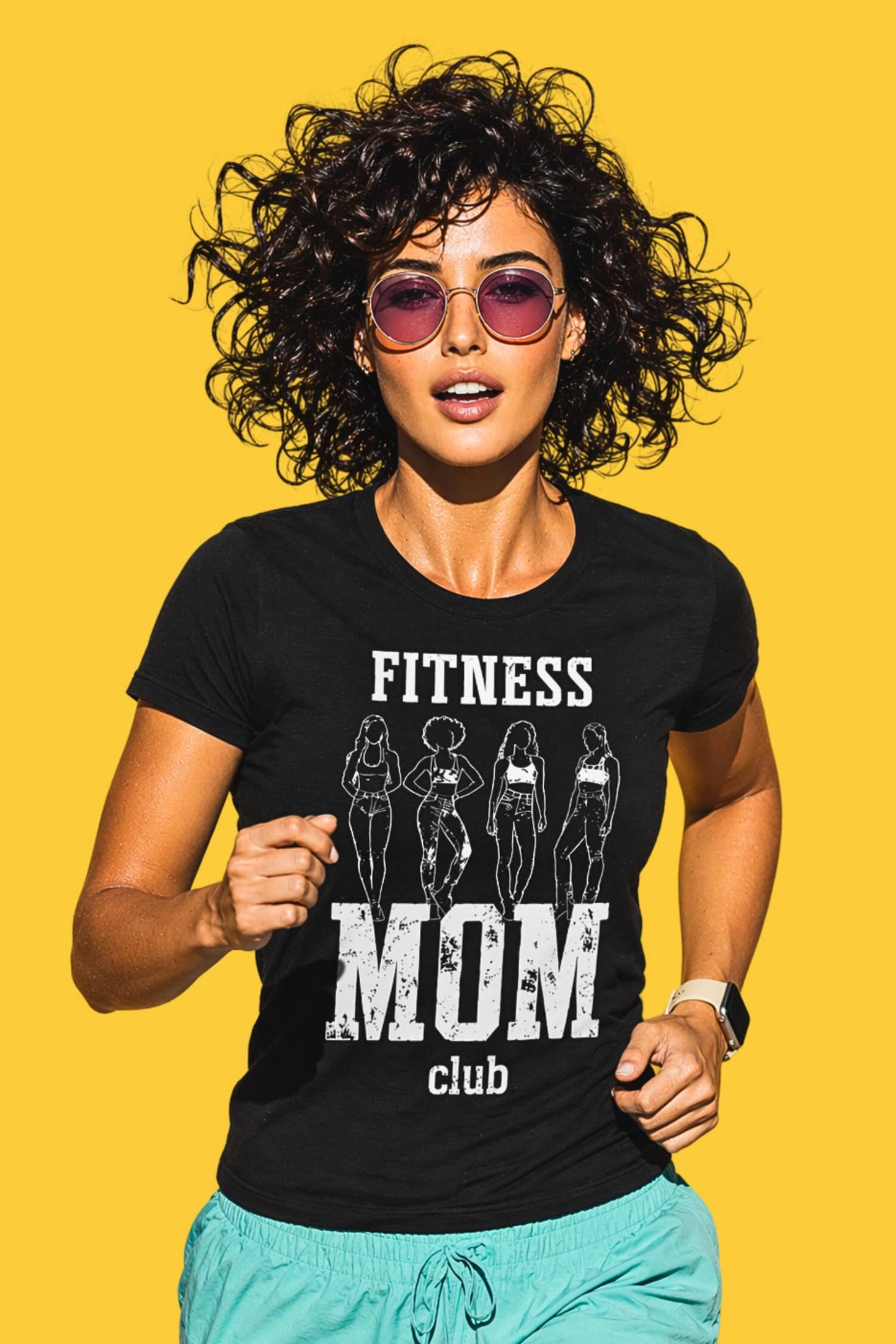 Woman with curly dark hair and pink sunglasses wearing black Fitness Mom Club t-shirt with workout women silhouettes graphic