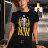 Woman with short red hair wearing black badass MOM t-shirt featuring tactical female silhouettes graphic